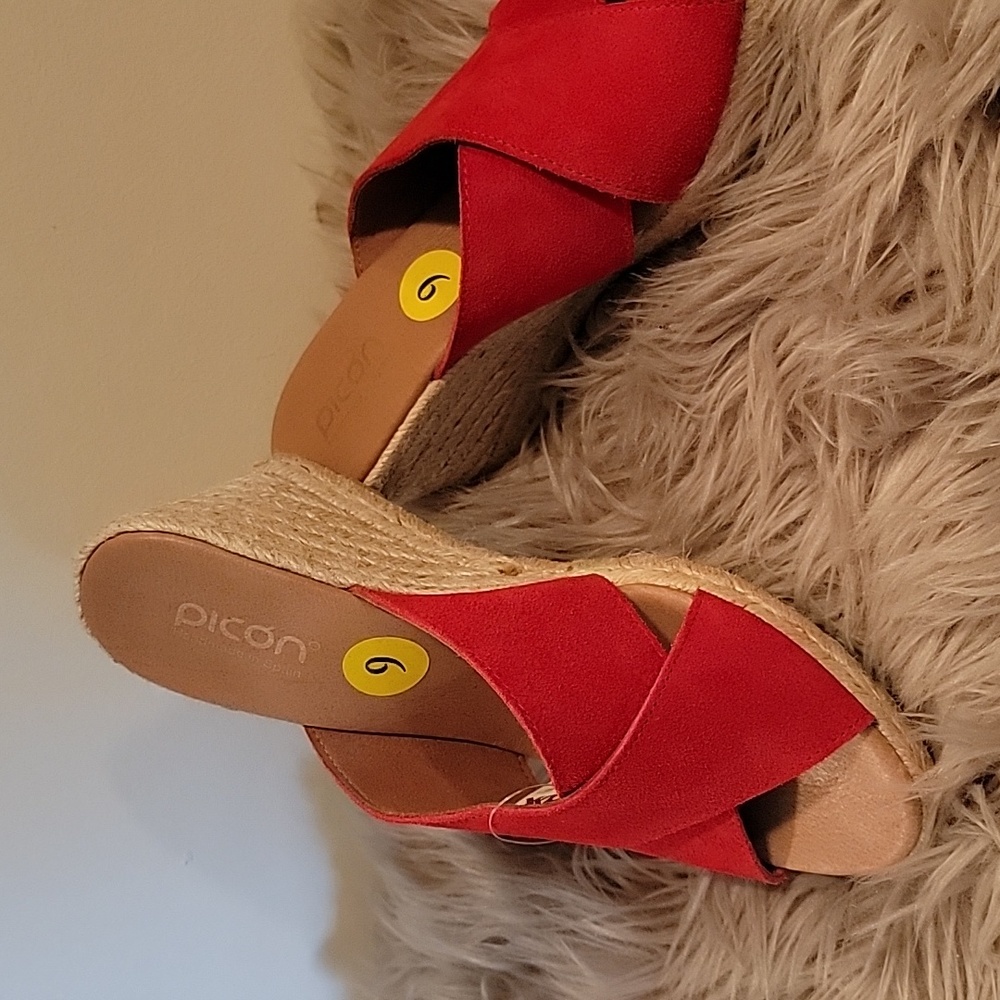 Beautiful red wedge shoes to be worn with nice summer dresses. Size 9.